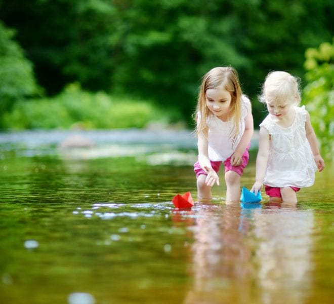 Kids Playing on River